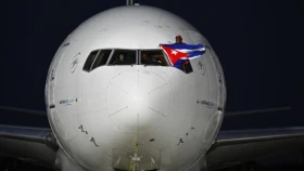 Ұшақ терезесінен шыққан: Олимпиаданы 5 рет ұтқан Куба балуанын әуежайда ерекше қарсы алды