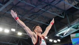 Бас бапкер: Курбанов чемпионға жарты ұпай ғана ұтылды